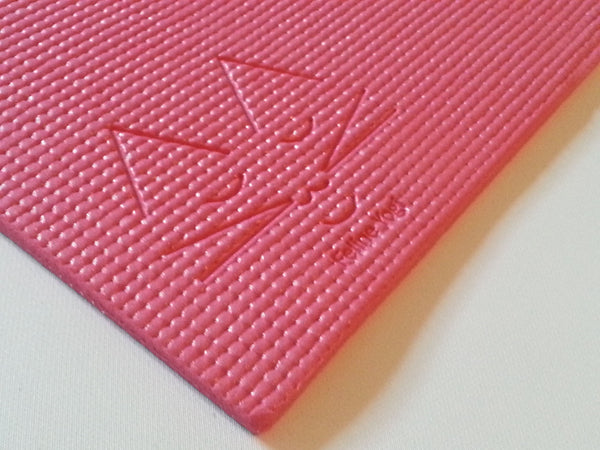 pink yoga cat mat with logo